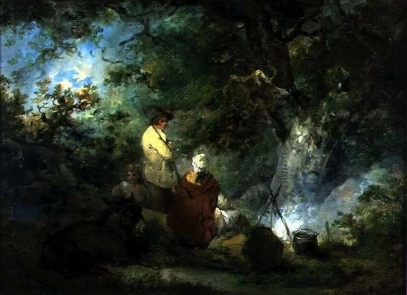 Zingari accanto a un falò